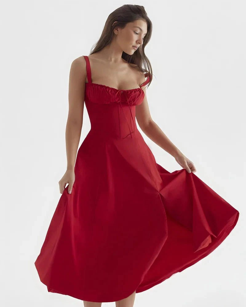 Woman wearing a red dress on a white background