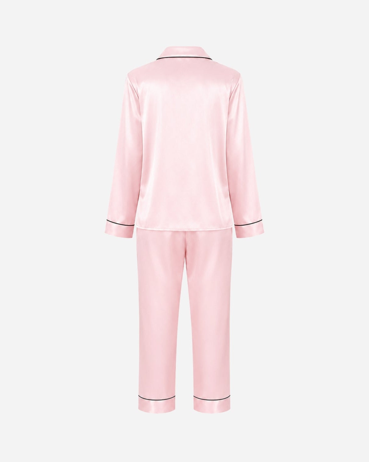 A light pink satin pajama set shown from the back, featuring a long-sleeve top and matching pants with thin black piping trim on the collar, cuffs, and hems, set against a plain light gray background.