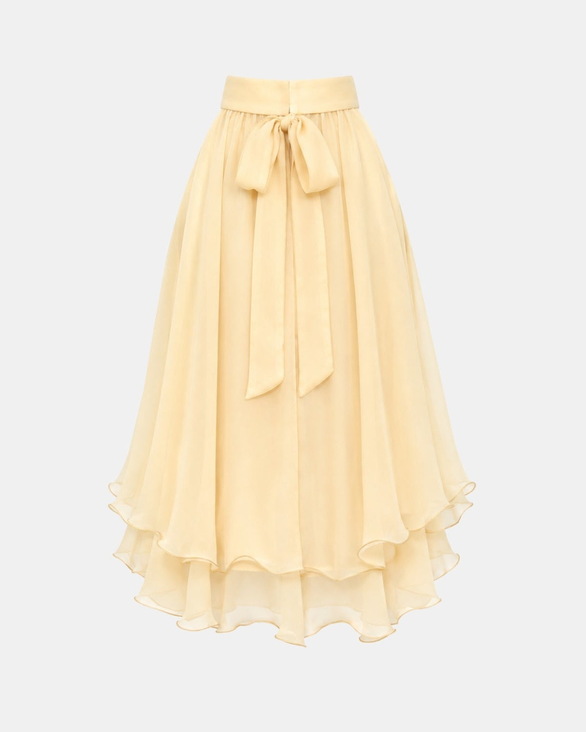 A pale yellow chiffon midi skirt with a high waist, a front tie bow, and a layered ruffled hem, shown against a light gray background.