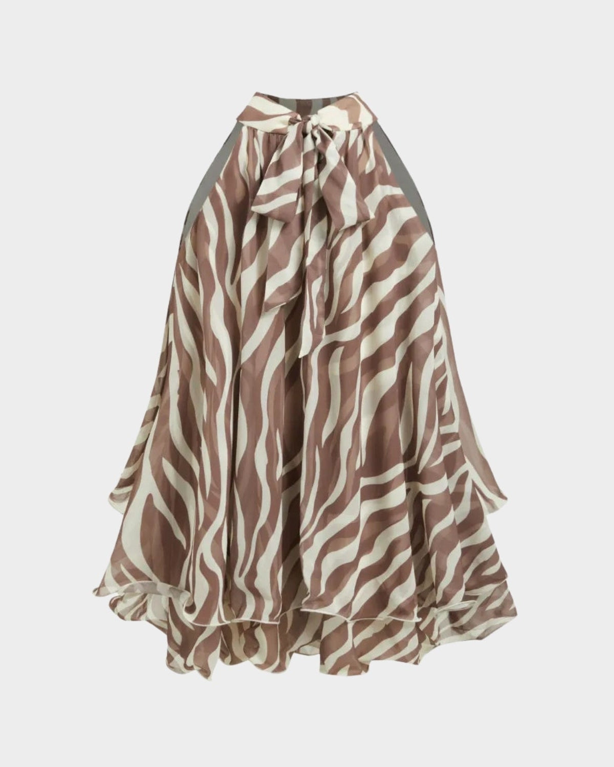 A high-low tiered skirt with a brown and beige zebra stripe pattern, featuring a ruffled high waistband and a large bow at the center front, shown against a light gray background.