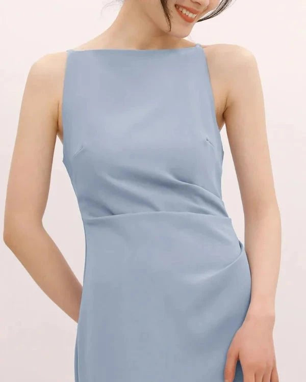 Light blue dress worn by a model on a plain background
