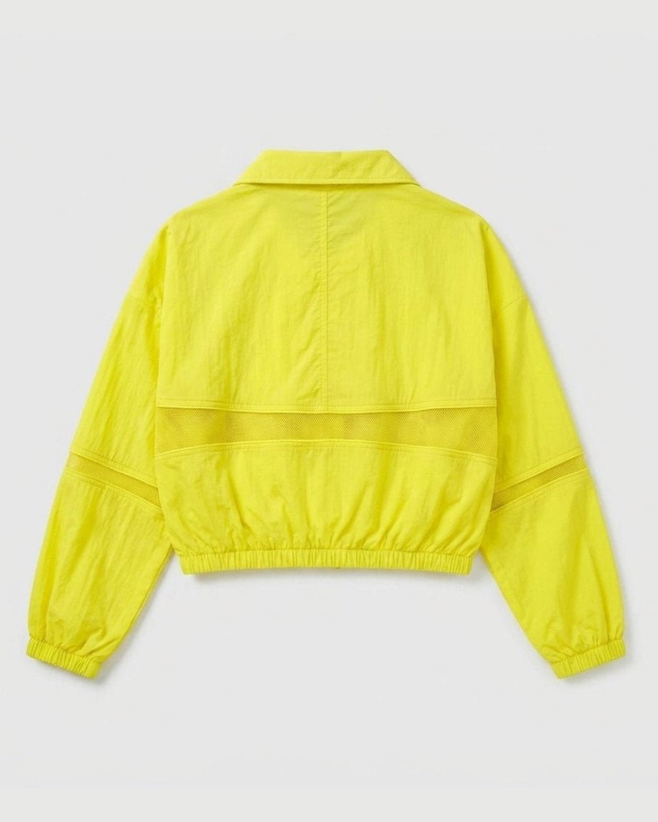 A bright neon yellow cropped windbreaker jacket shown from the back, featuring elasticated cuffs and hem, laid flat against a light gray background.