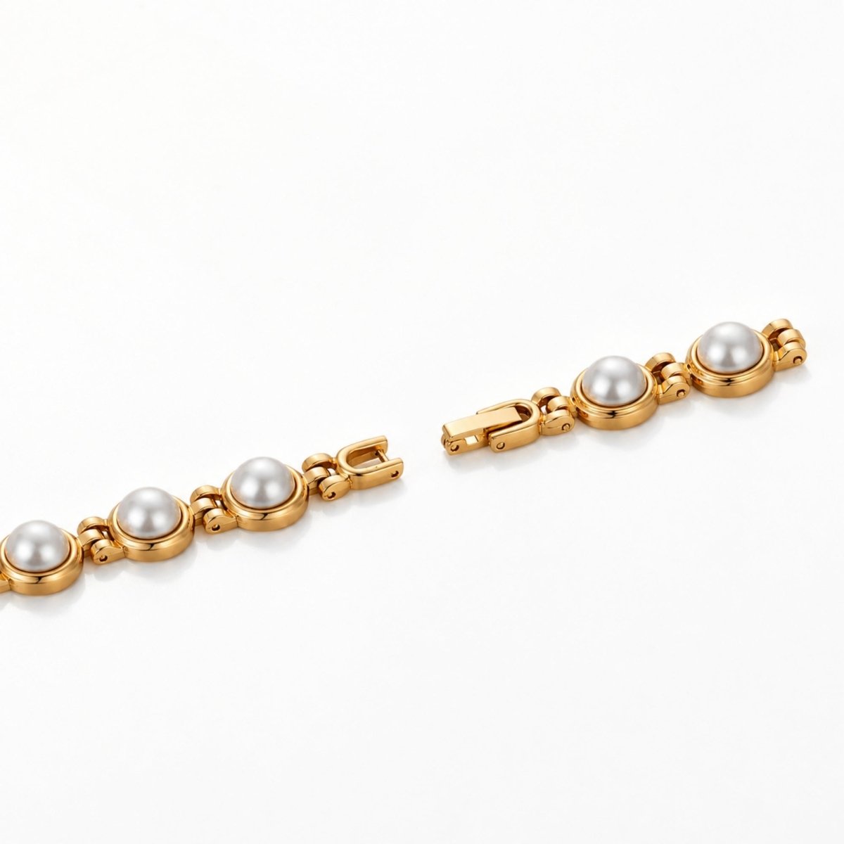 Close up macro shot of the adjustable gold jewelry clasp on the Kouvr women's elegant pearl watch strap.