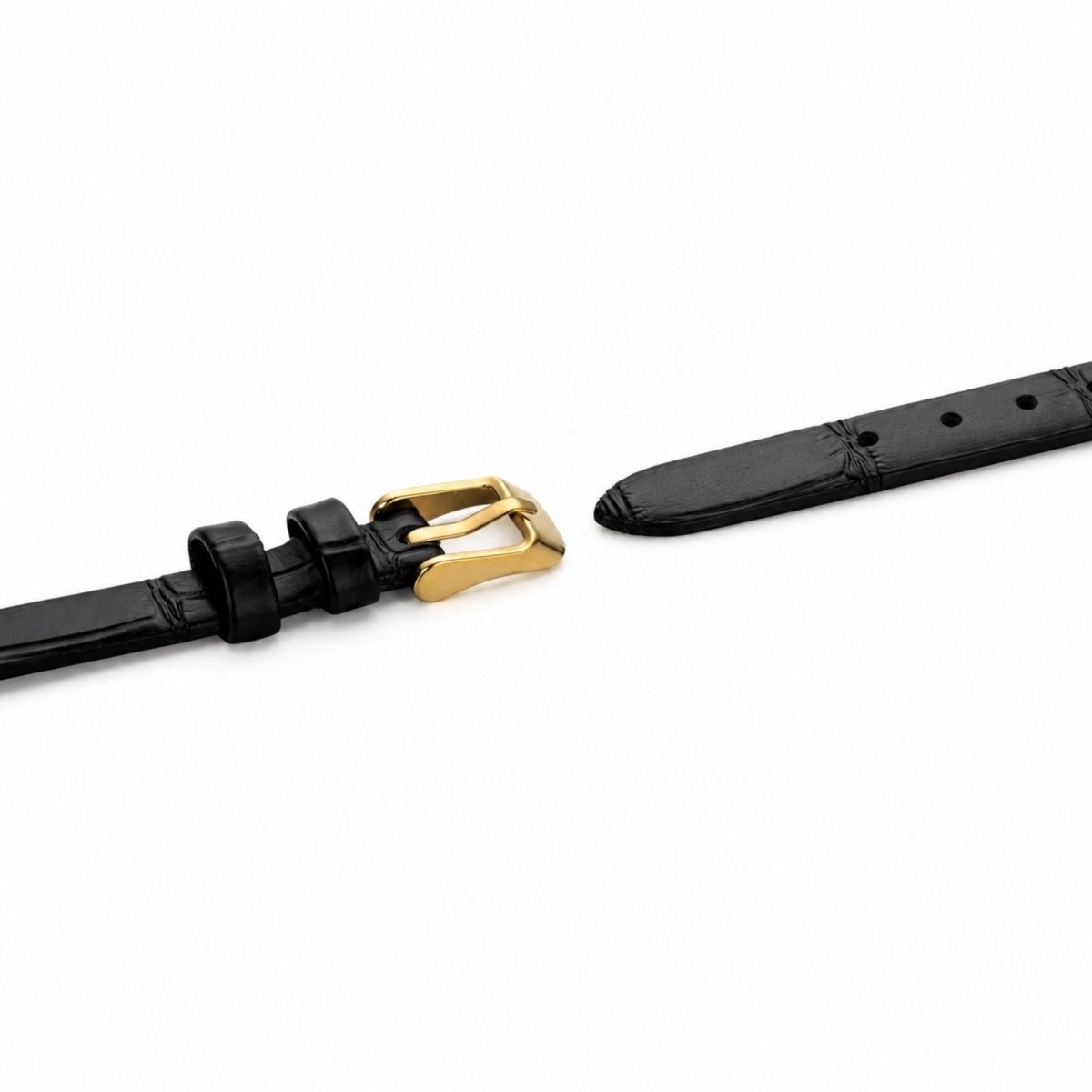 Close up of genuine black leather watch strap with textured finish and secure gold-toned buckle closure