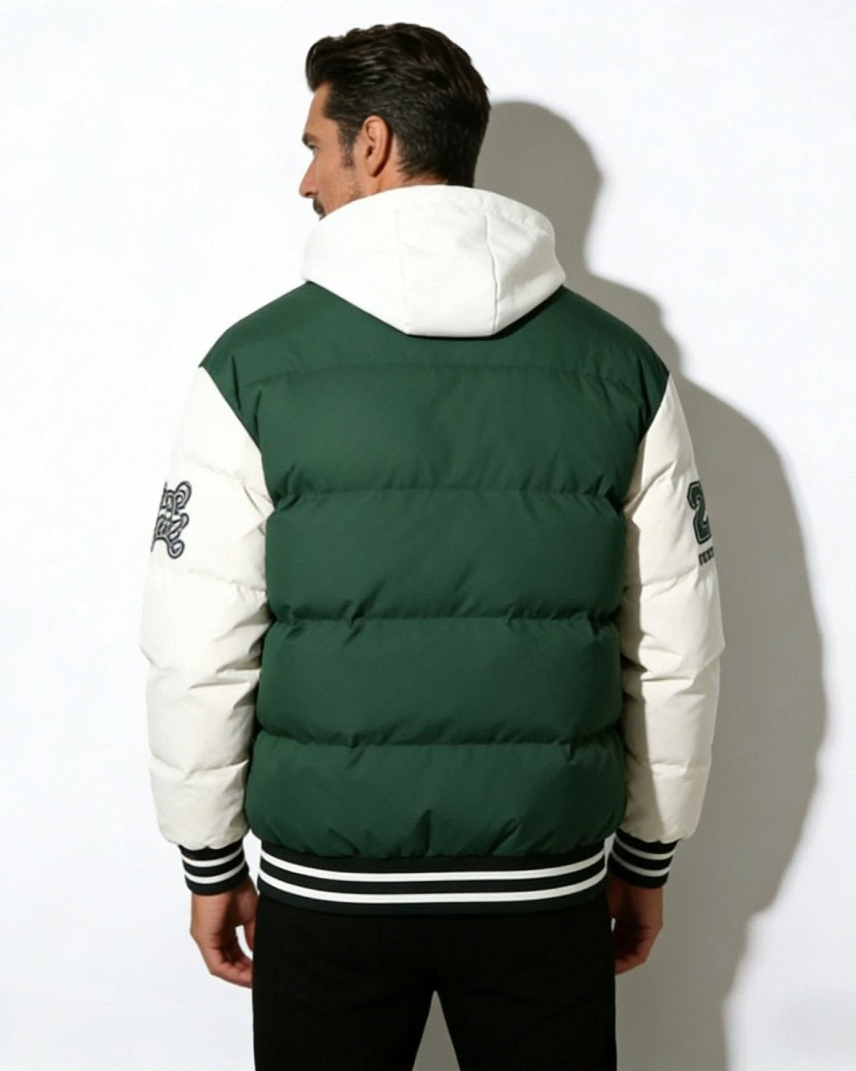 Back view of the Angelo Hooded Puffer Varsity Jacket, displaying the horizontal quilting on the green body and patches on both sleeves.