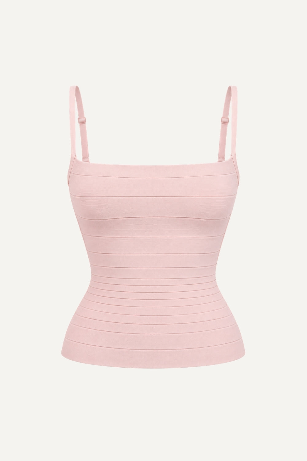 A light pink ribbed knit camisole top with thin adjustable shoulder straps, displayed on a clean, off-white background.