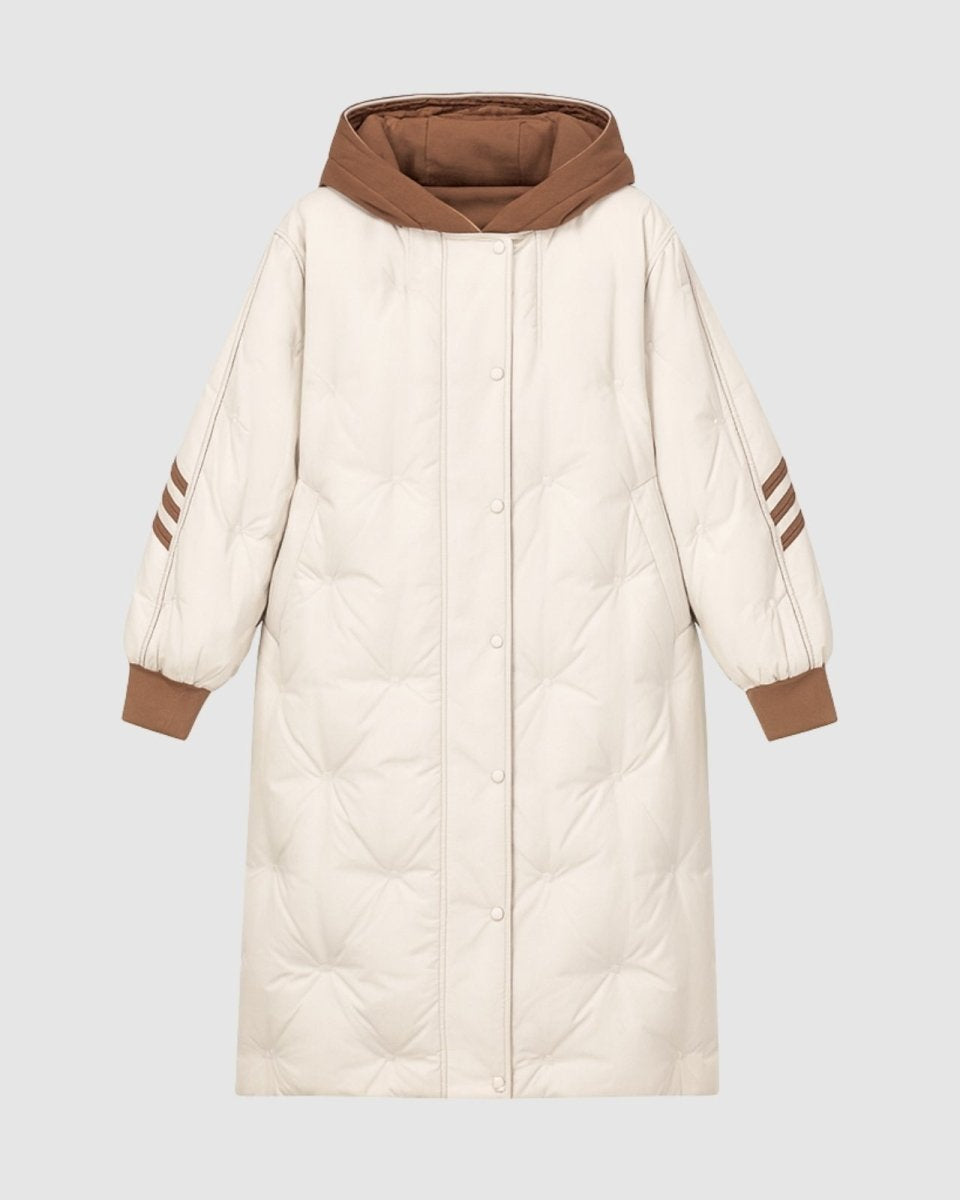 Flat lay product shot of the Arianne women's long down coat, showing the front snap button closure and diamond quilting pattern. 