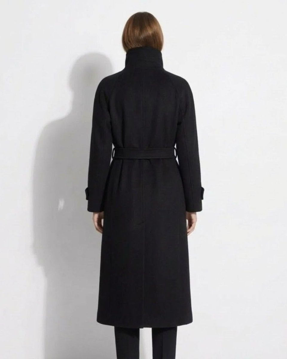 Back view of the Ashley black wool coat, highlighting the raglan sleeves and belted waist.