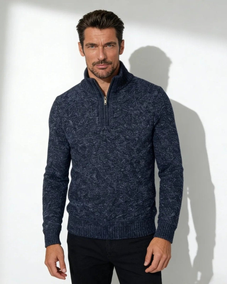 Man wearing the Elyson men's textured quarter-zip sweater in a deep navy marl, styled with black trousers.