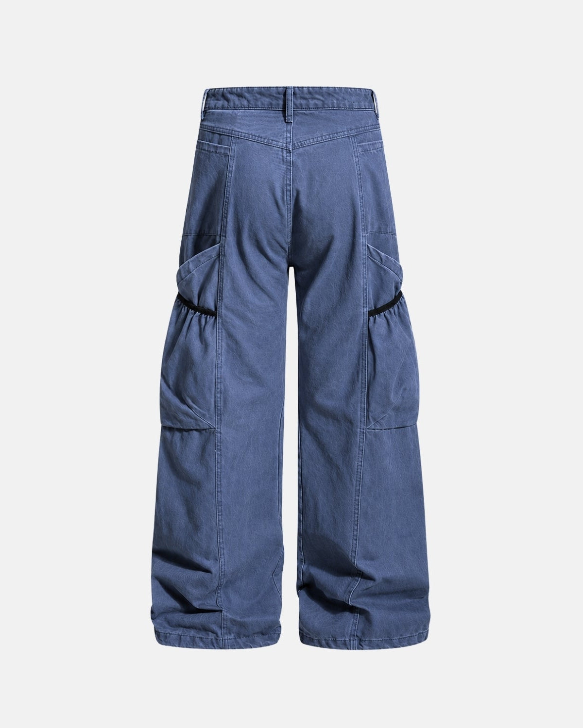 A pair of wide-leg cargo pants in a medium blue denim-like fabric, shown from the back against a light gray background.