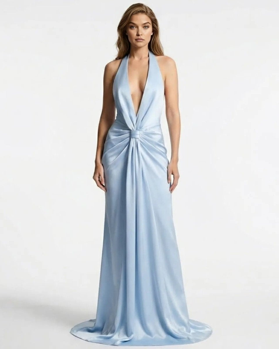 Model wearing the light blue Beverly satin halter gown with a plunging neckline and twist front detail, viewed from the front.