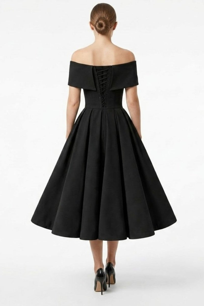 Back view of a black formal midi dress highlighting the intricate lace-up corset back detail