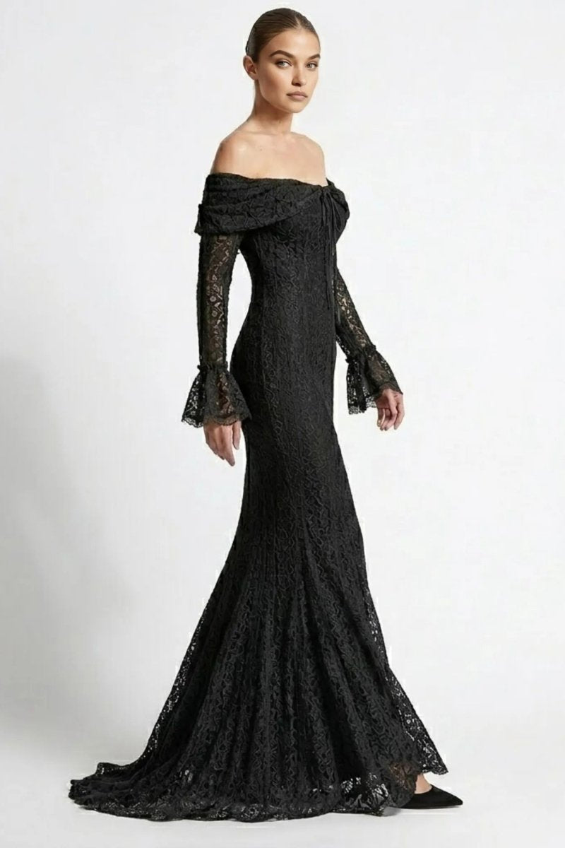 Side profile view highlighting the fitted flattering mermaid silhouette of a black lace formal evening gown