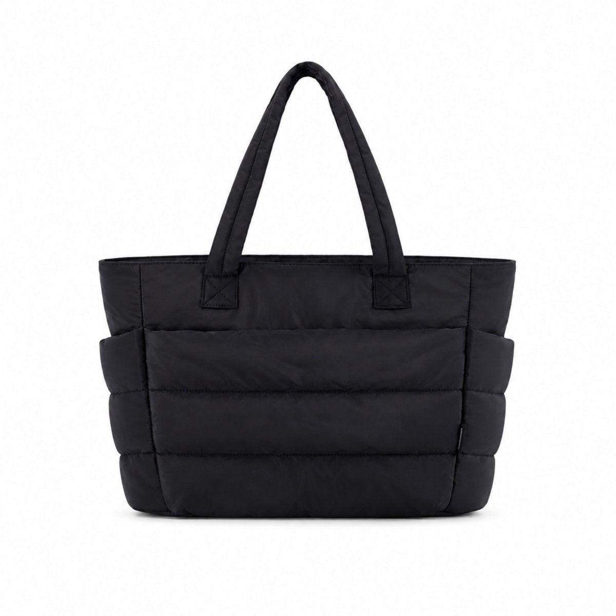 Front profile of a large black quilted puffer tote bag made of water-resistant nylon.