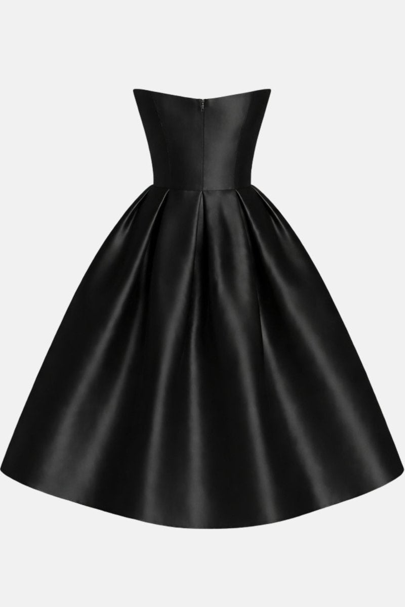Studio product shot back view of black satin flared a-line midi dress by Fenlo Form
