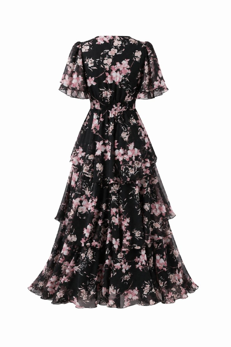 Studio product shot back view of black floral flutter sleeve maxi dress