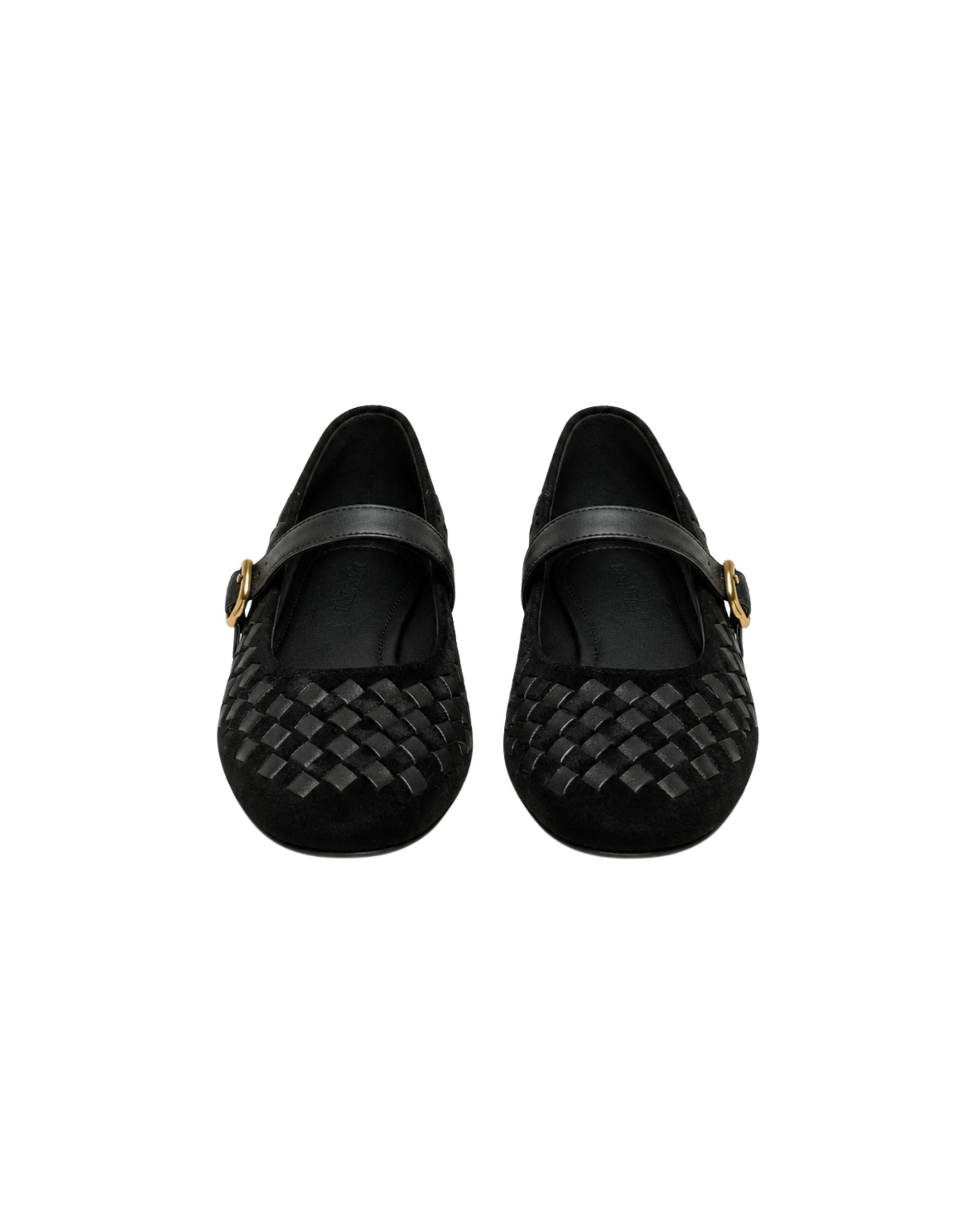 Front view of black woven suede Mary Jane flats with smooth leather straps and polished gold buckles