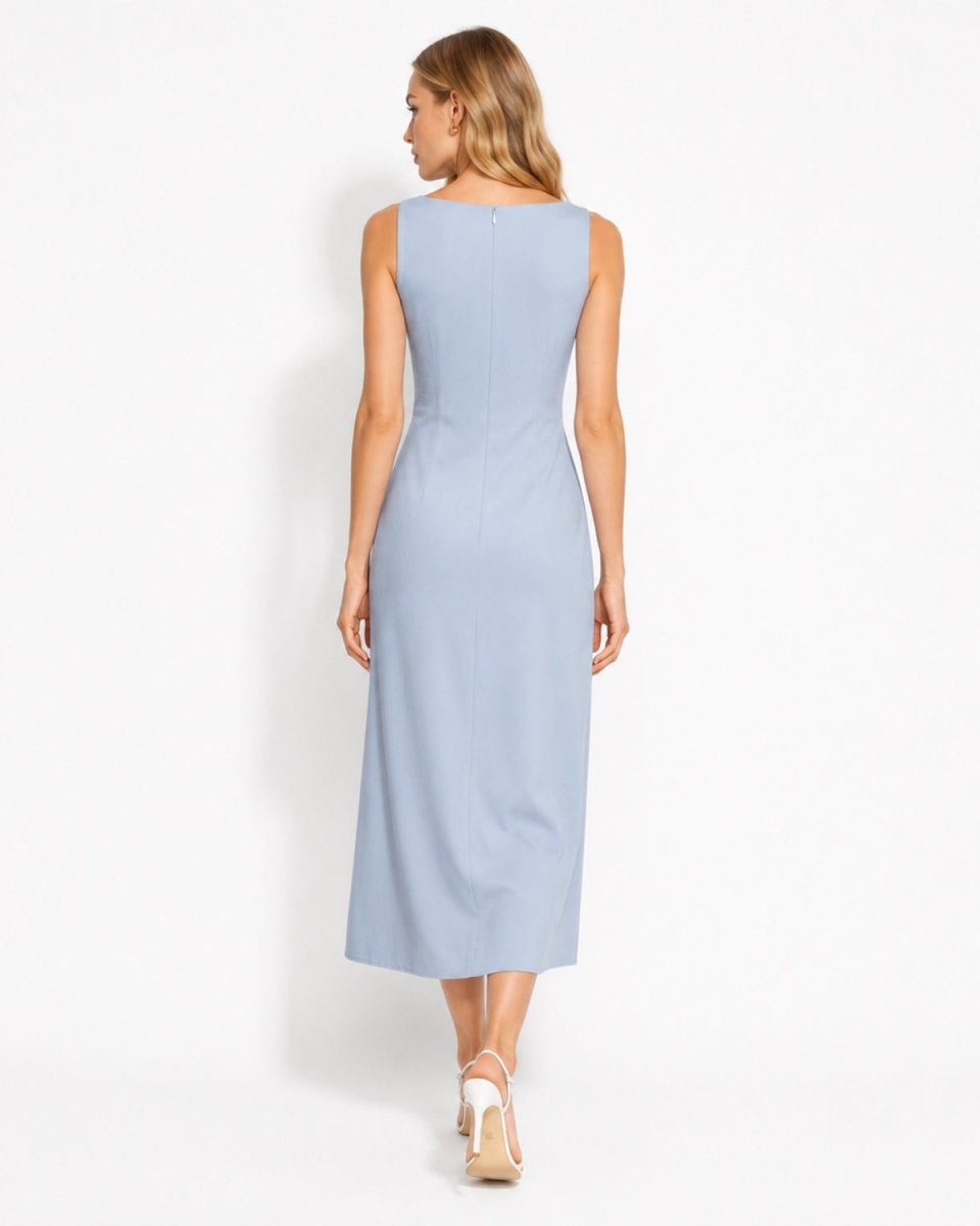 A woman modeling a light blue sleeveless midi dress from the back, shown against a plain white studio background.