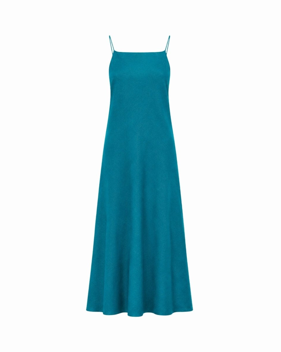 Front view of the teal minimalist midi slip dress on a plain white background highlighting the clean square neck.