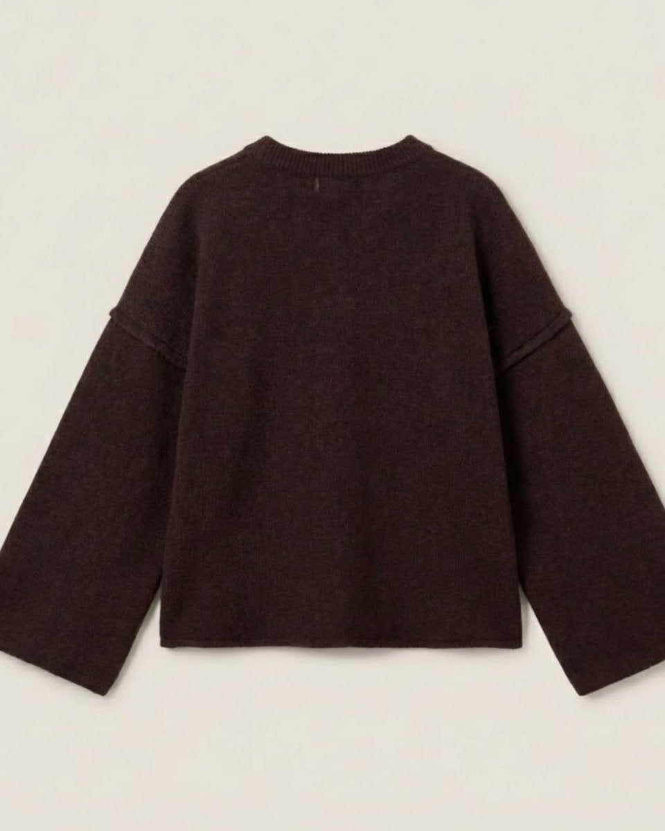 Back flat lay of the dark brown wool sweater with drop shoulder detail.