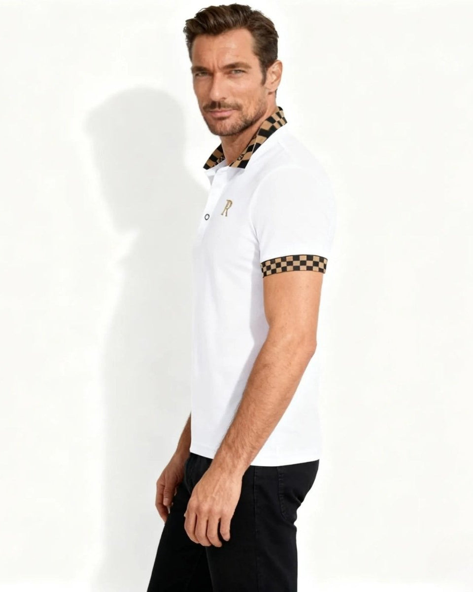 Side profile of a male model in the white polo with checkered trim on the collar and short sleeve cuff, showing the slim fit.
