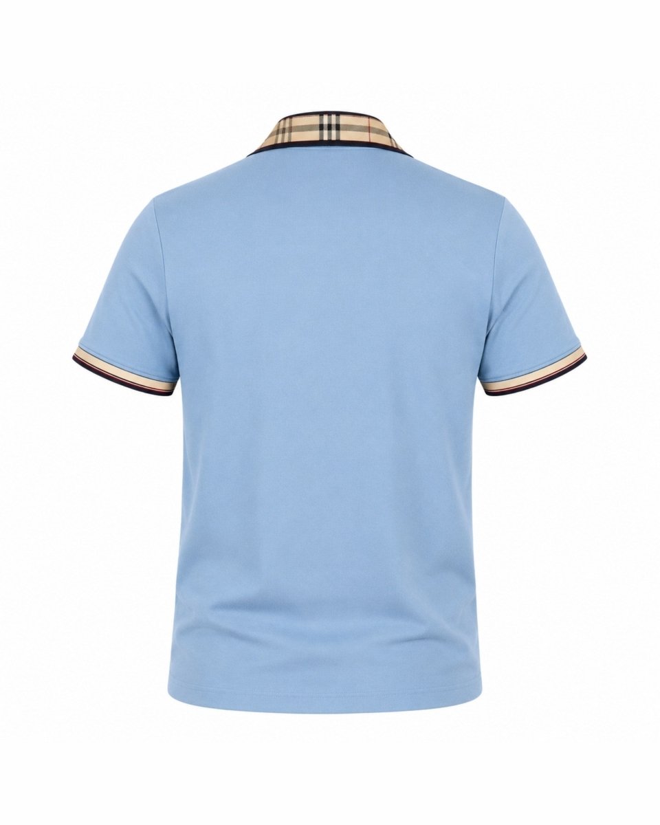 A light blue short-sleeve polo shirt shown from the back, featuring a beige plaid collar and contrasting beige and dark trim on the sleeve cuffs.