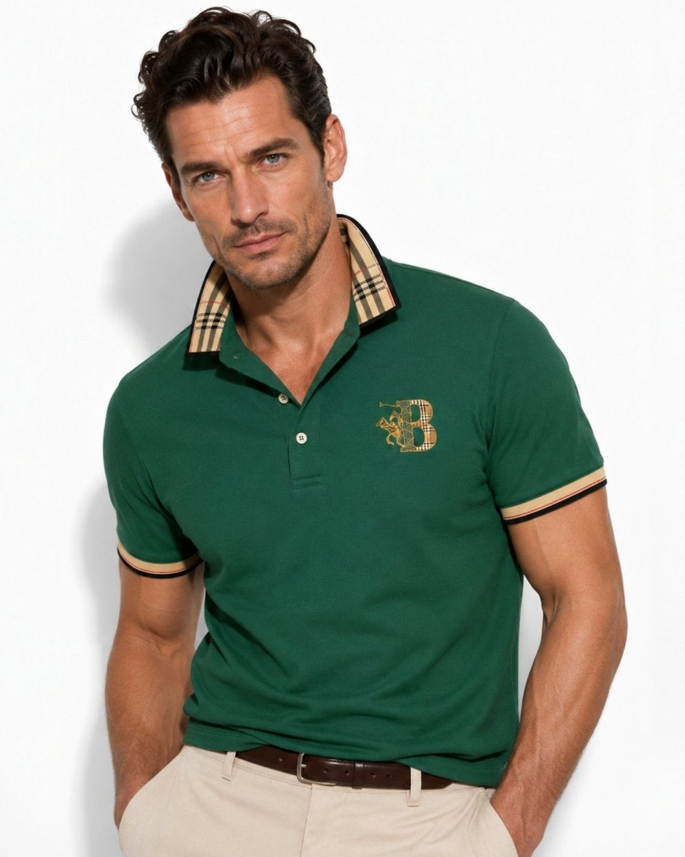 Man wearing a green polo shirt with a brand logo on a white background