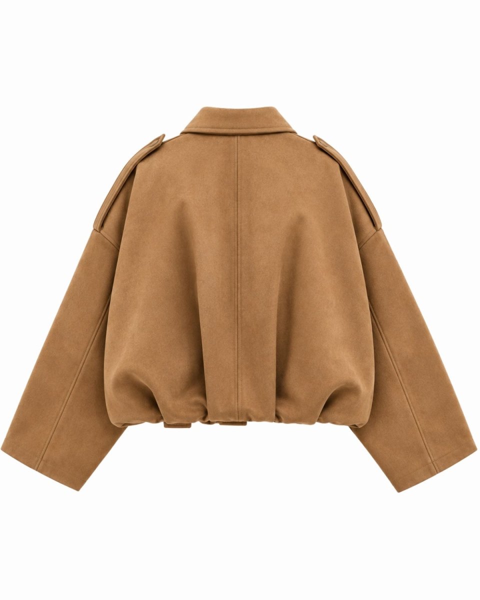 A cropped tan faux-suede jacket with dramatic balloon sleeves and shoulder epaulets, shown from the back on a solid white background.