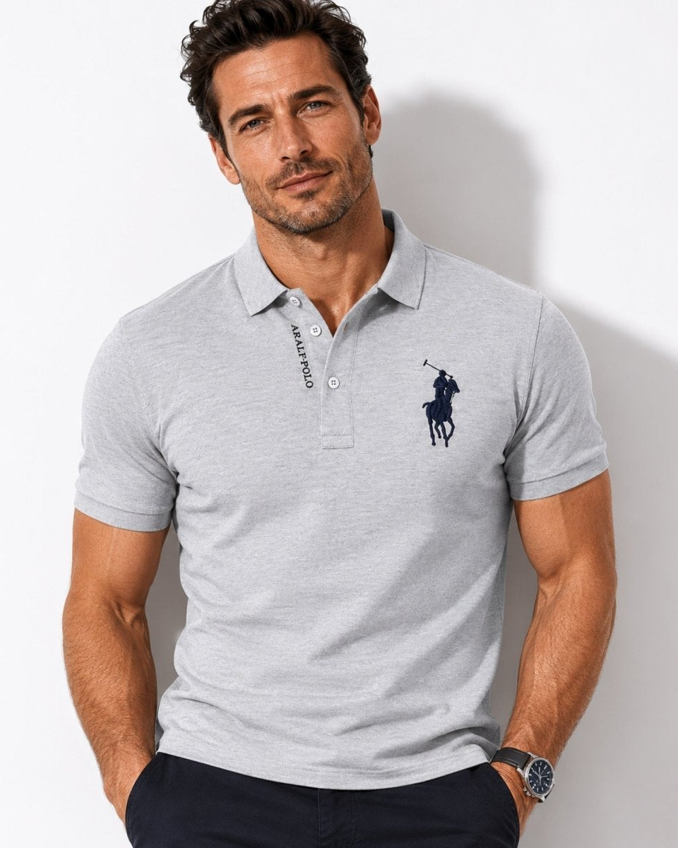 Man wearing a gray Polo Ralph Lauren polo shirt against a plain background