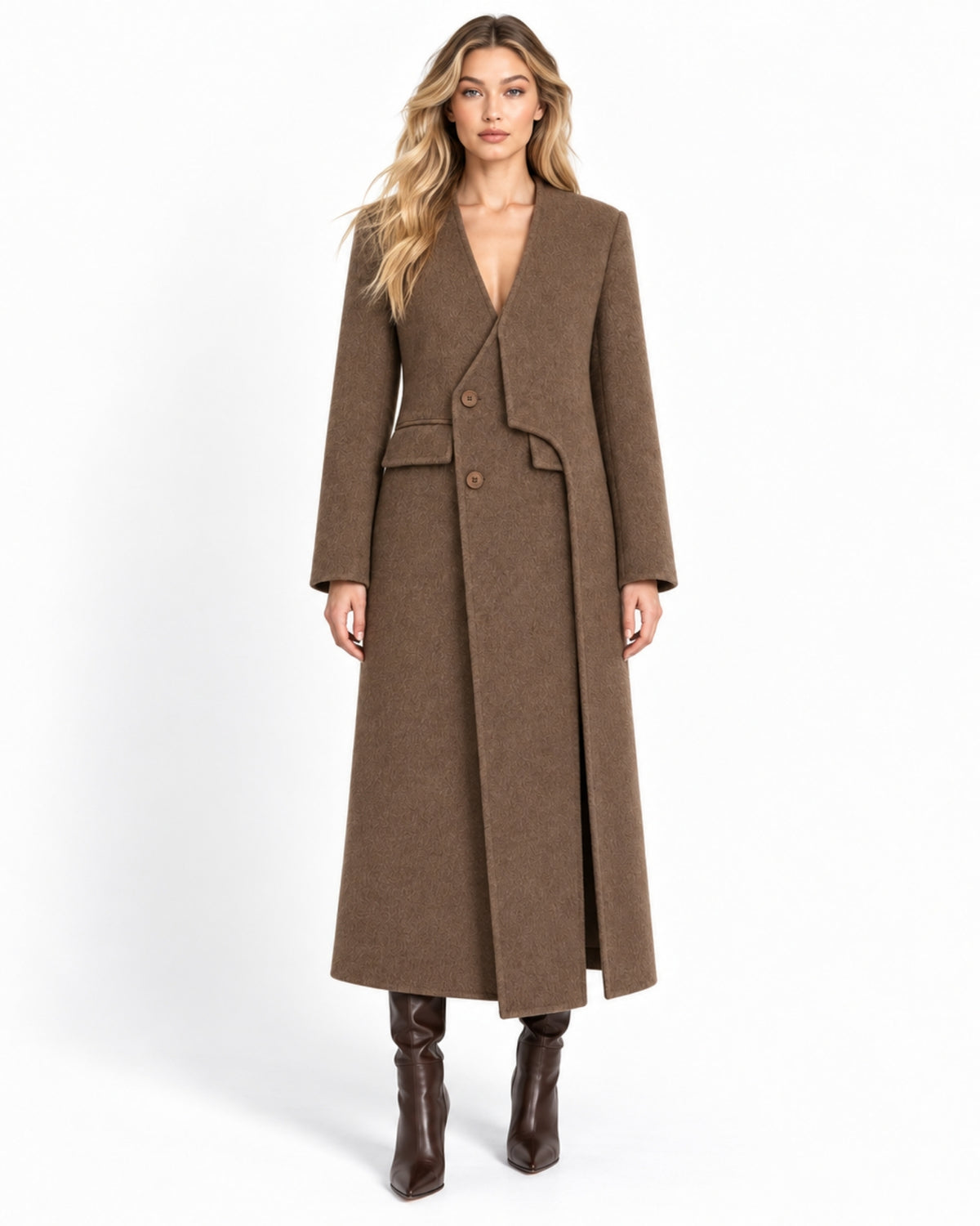  Front view of a woman wearing the asymmetrical structural maxi coat, featuring a deep V-neck, architectural overlap, and tailored fit.