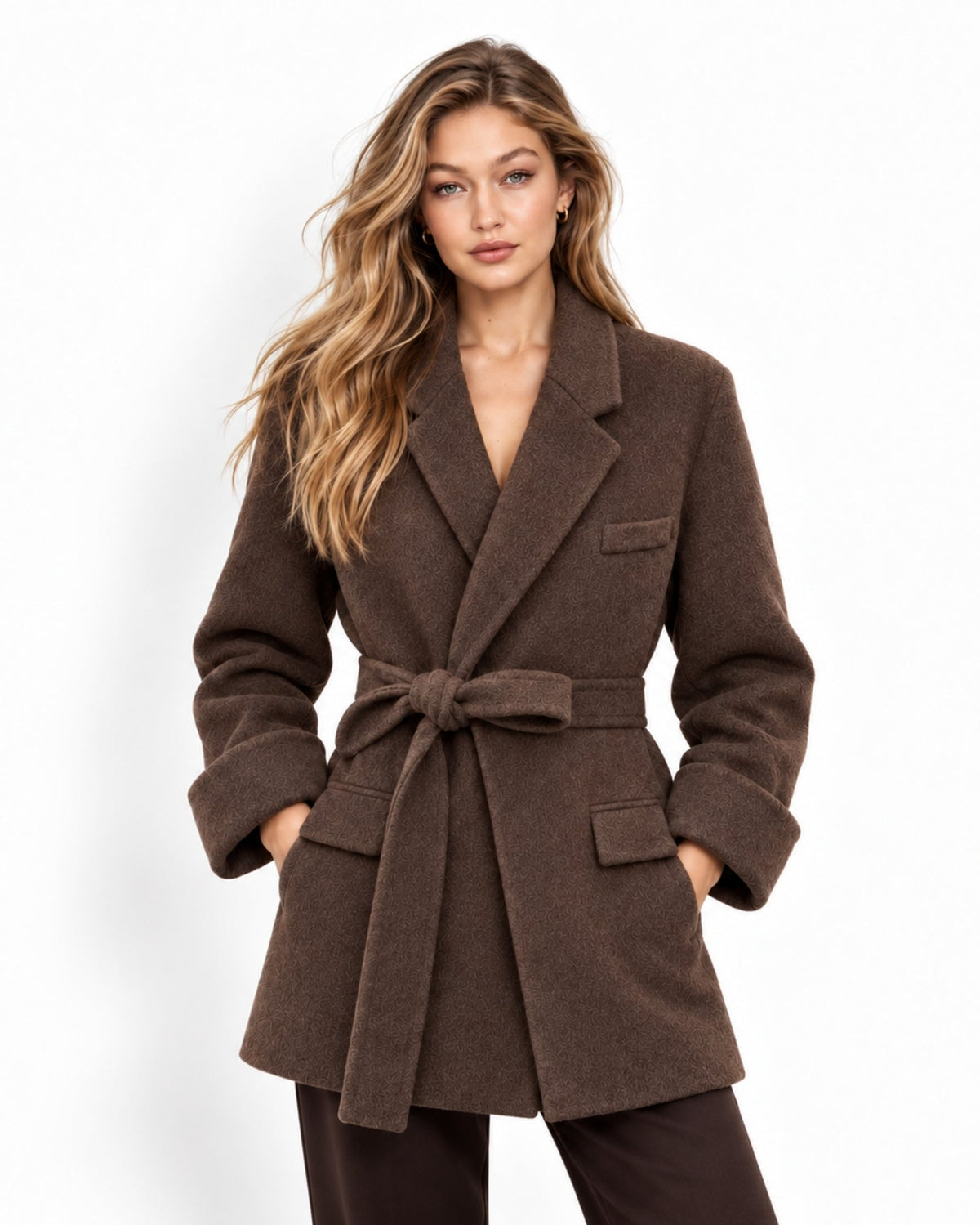 A woman modeling a dark brown wool-blend wrap coat with a matching tie belt, shown against a plain white studio background.