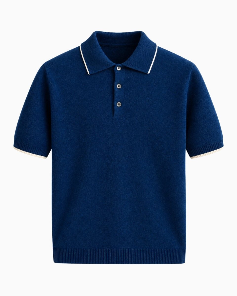 A navy blue short-sleeve knit polo shirt with white contrast piping on the collar and sleeve cuffs, featuring a three-button placket, shown against a plain white background.
