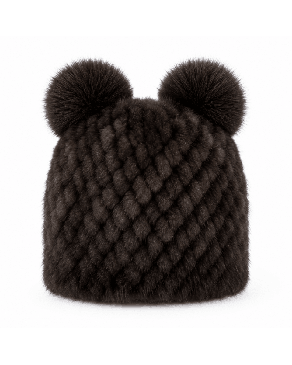 A dark brown faux fur beanie hat featuring a textured diamond pattern and two matching pom-poms on top, shown against a plain white background.