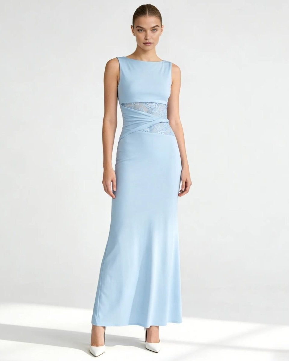 Model wearing the Deborah Gown in light blue, showing the front view with bateau neckline and asymmetric lace waist detail.