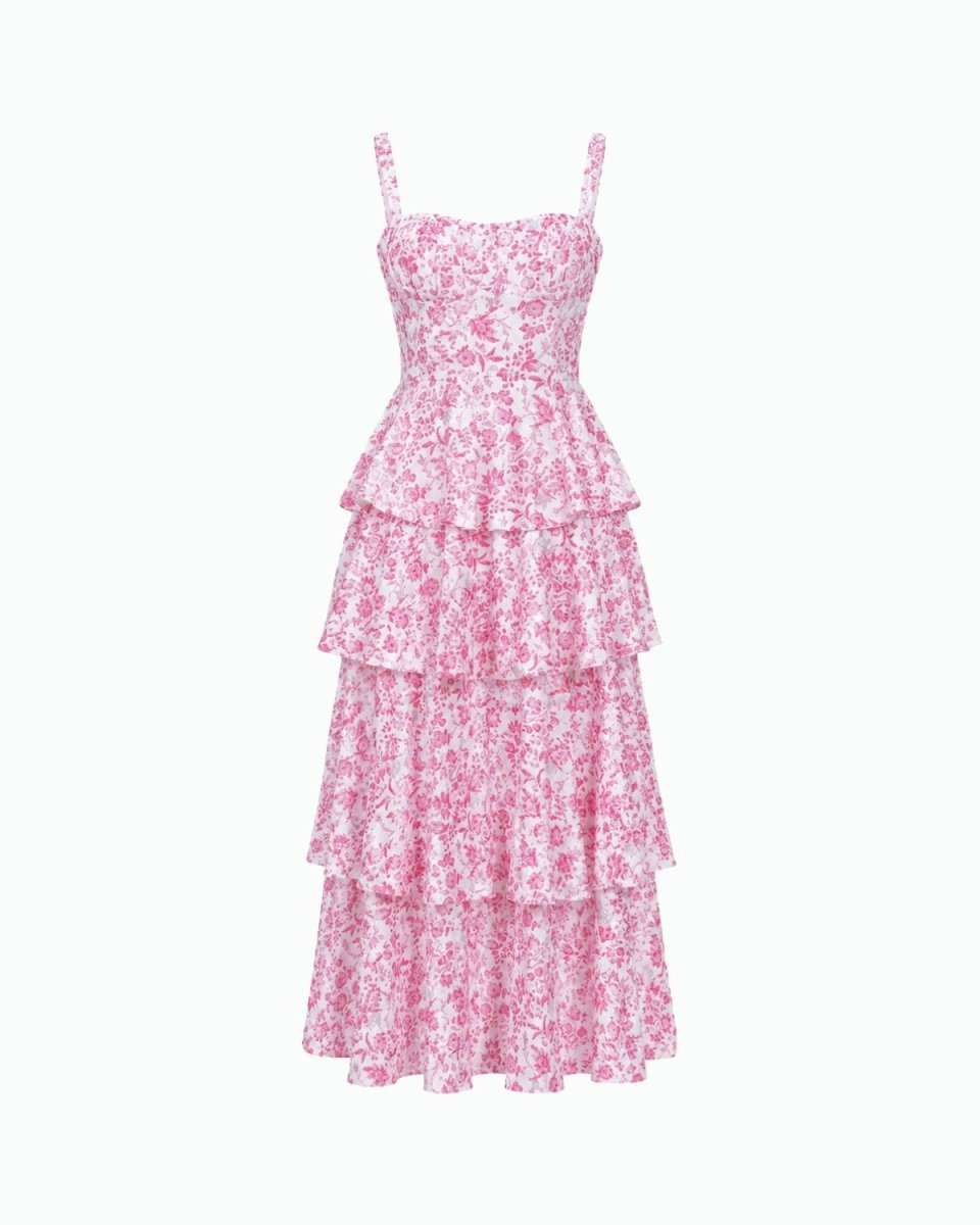 A pink and white floral print tiered maxi dress with spaghetti straps, shown against a plain white background.