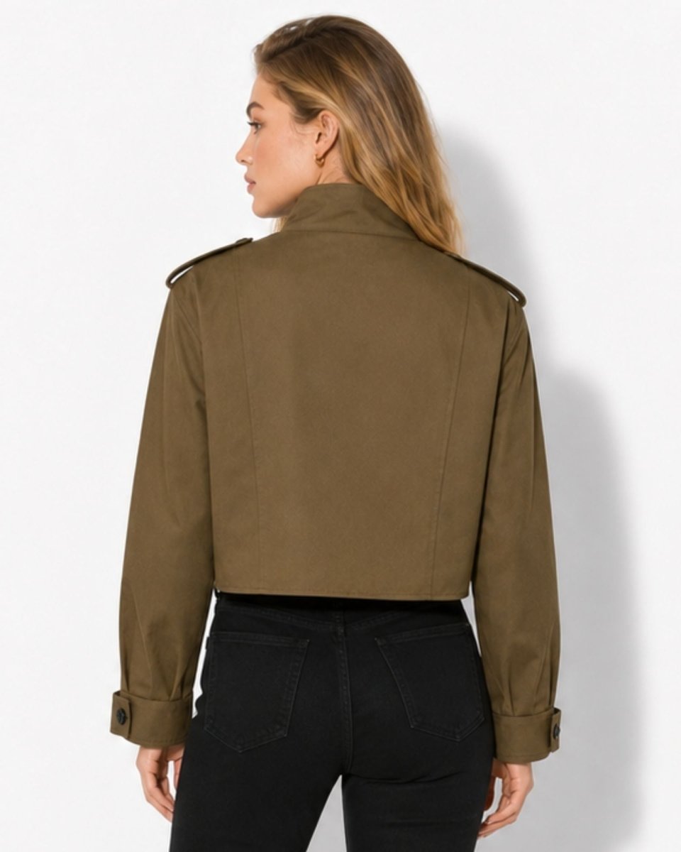 Back view of designer olive green cropped jacket showing a flawless tailored fit and modern boxy silhouette.

