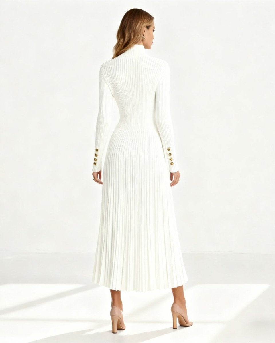 Rear view of the Dianne white midi dress, detailing the fitted ribbed bodice and fluid pleated skirt.