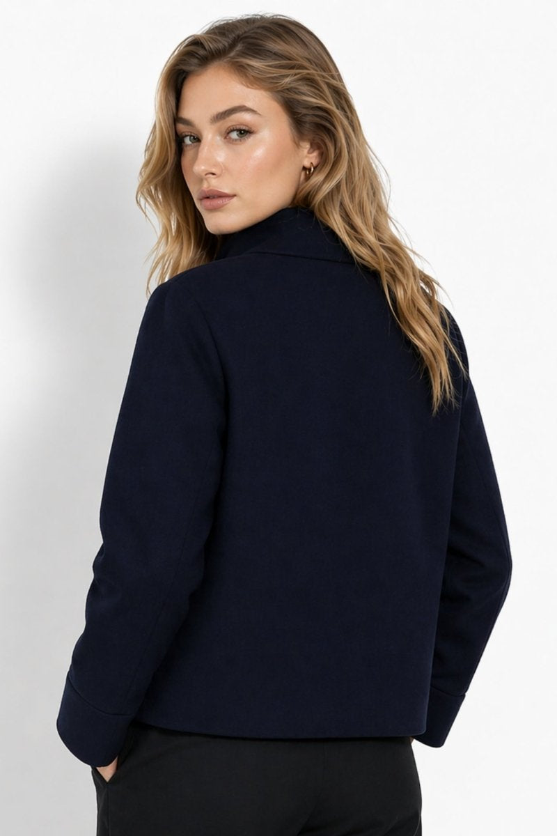 Back view of relaxed boxy fit drop shoulder jacket in dark navy.