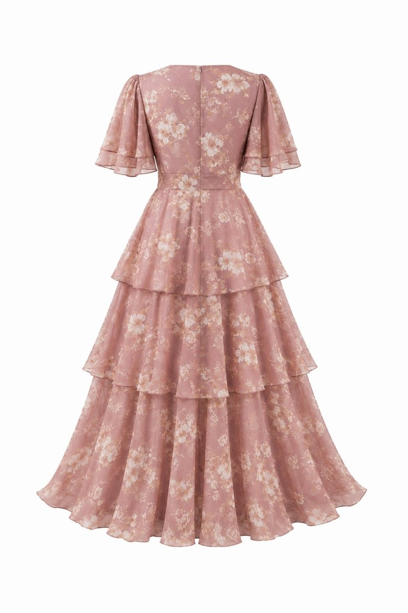 Studio product shot back view of pink romantic floral flutter sleeve gown