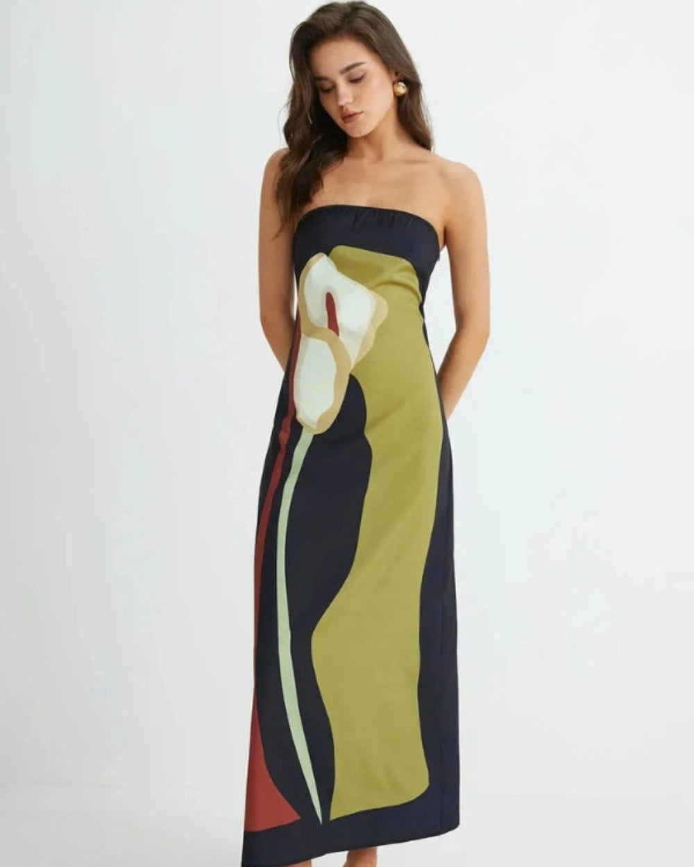 Model wearing the Elizabeth abstract floral strapless evening dress