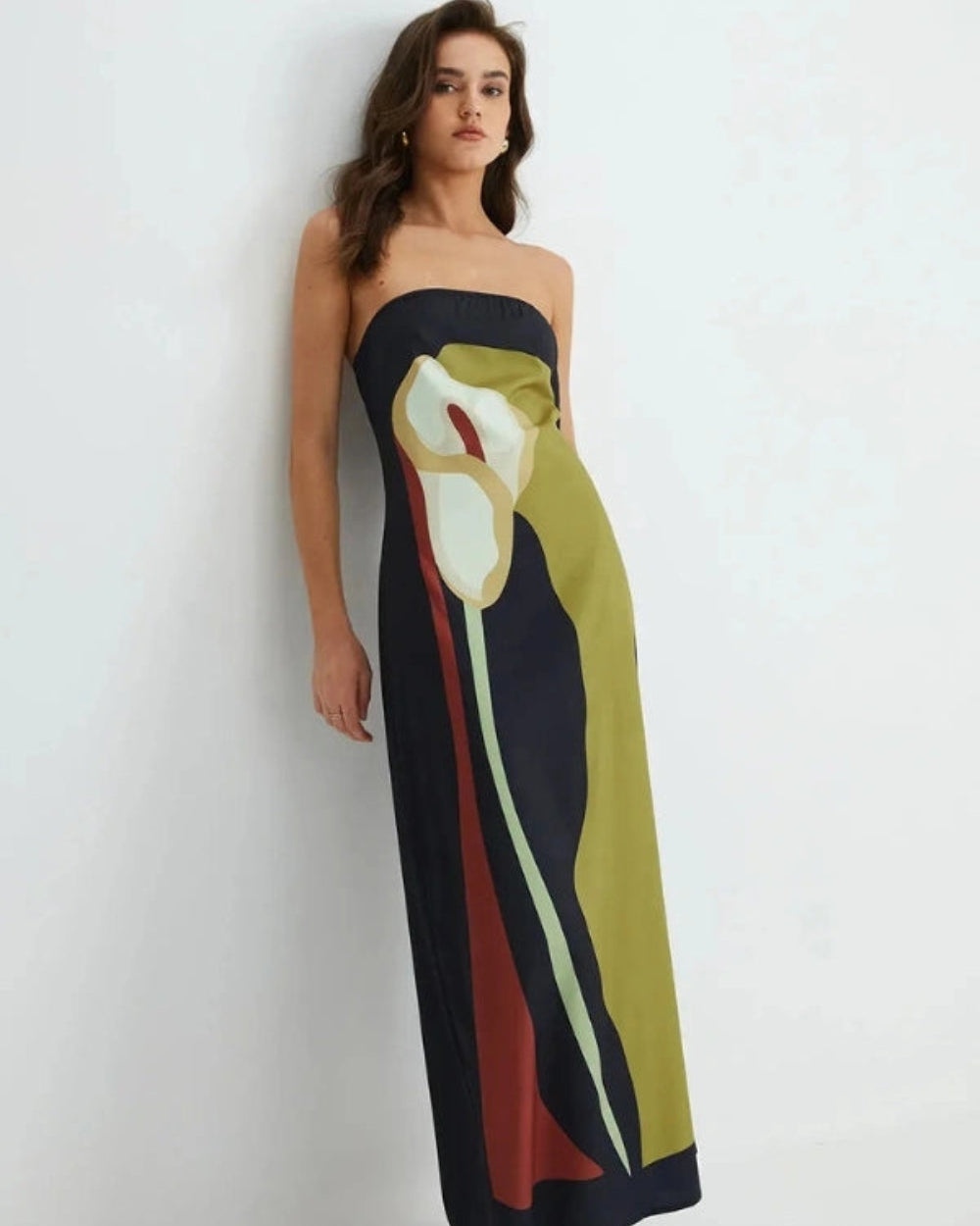 Model wearing the Elizabeth abstract floral strapless evening dress