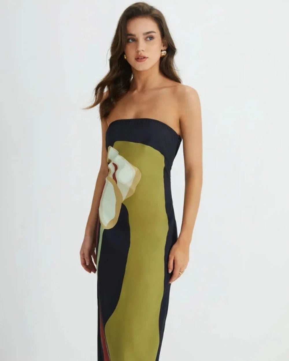 Model wearing the Elizabeth abstract floral strapless evening dress