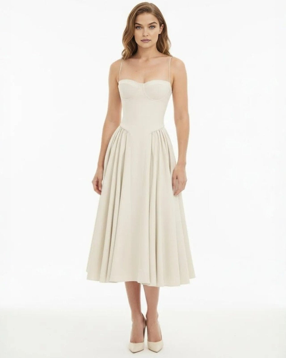 Model wearing the ecru bustier midi dress with a structured corset bodice and A-line skirt, front view.
