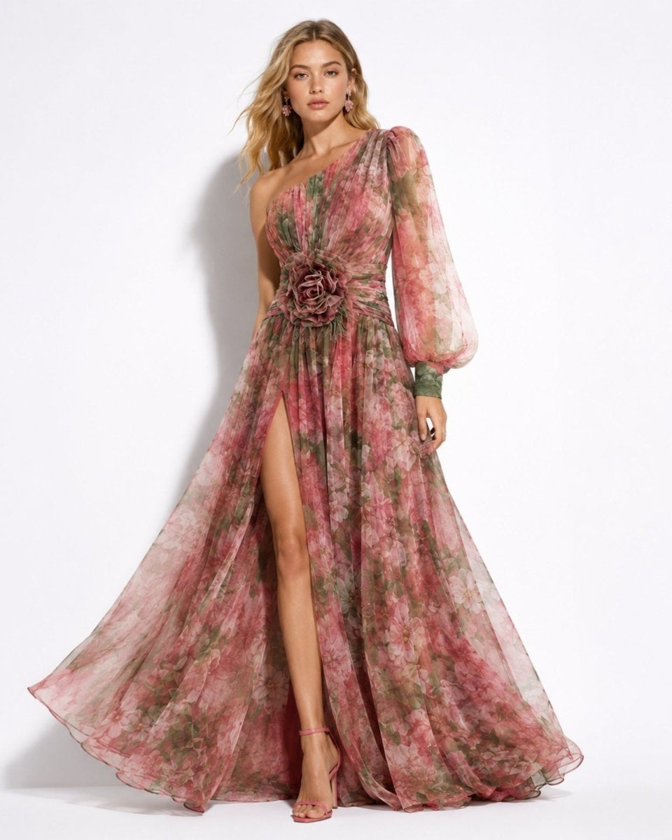 Woman wearing a floral dress with a high slit on a white background