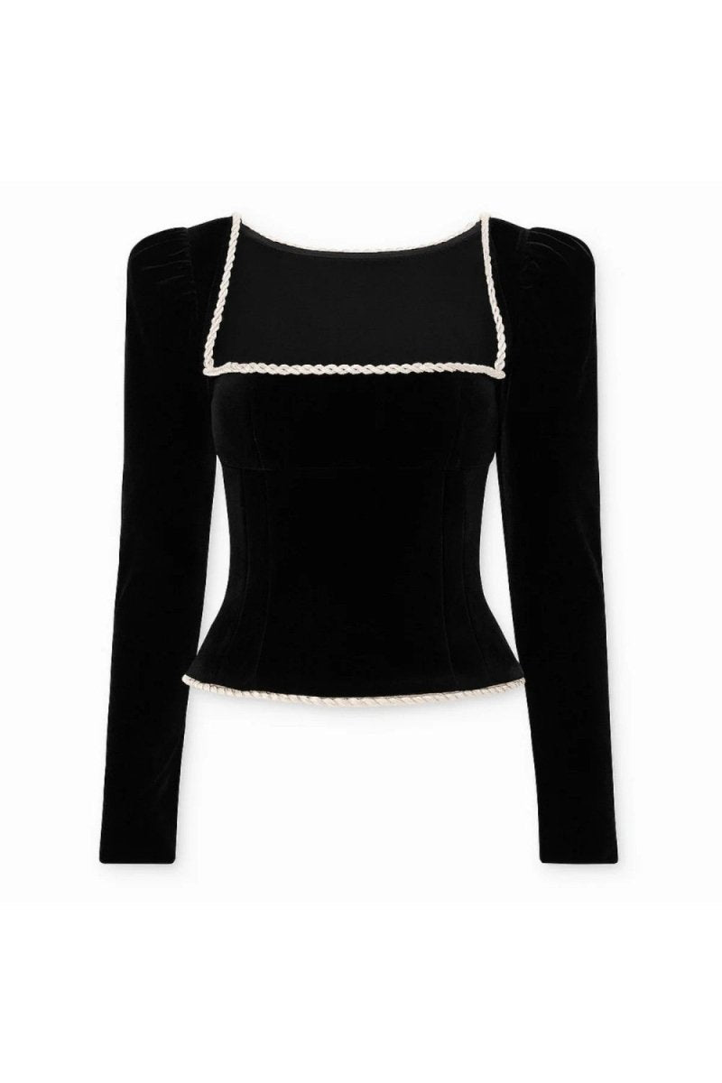 A black velvet long-sleeve crop top with a square neckline, featuring white braided trim along the neckline and hem, displayed on a clean white background.