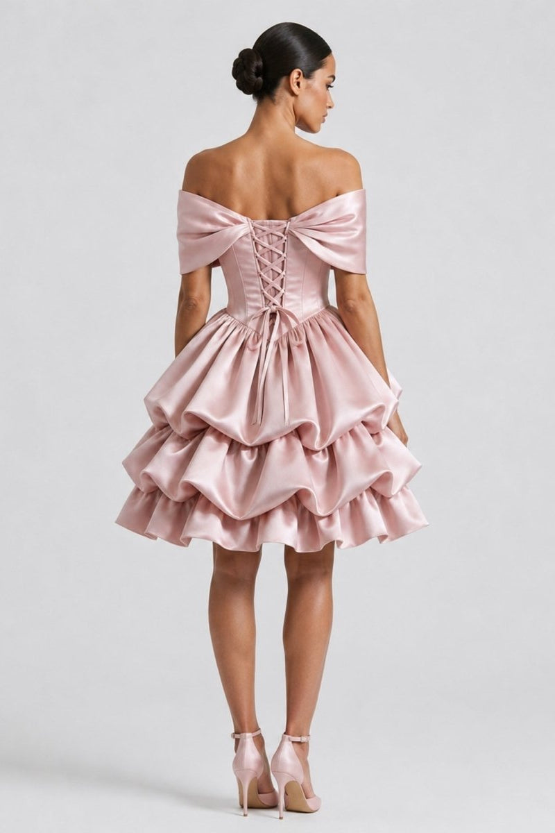 Back view of Fenlo Form pink satin mini dress highlighting adjustable lace-up corset back closure and shoulder drape.