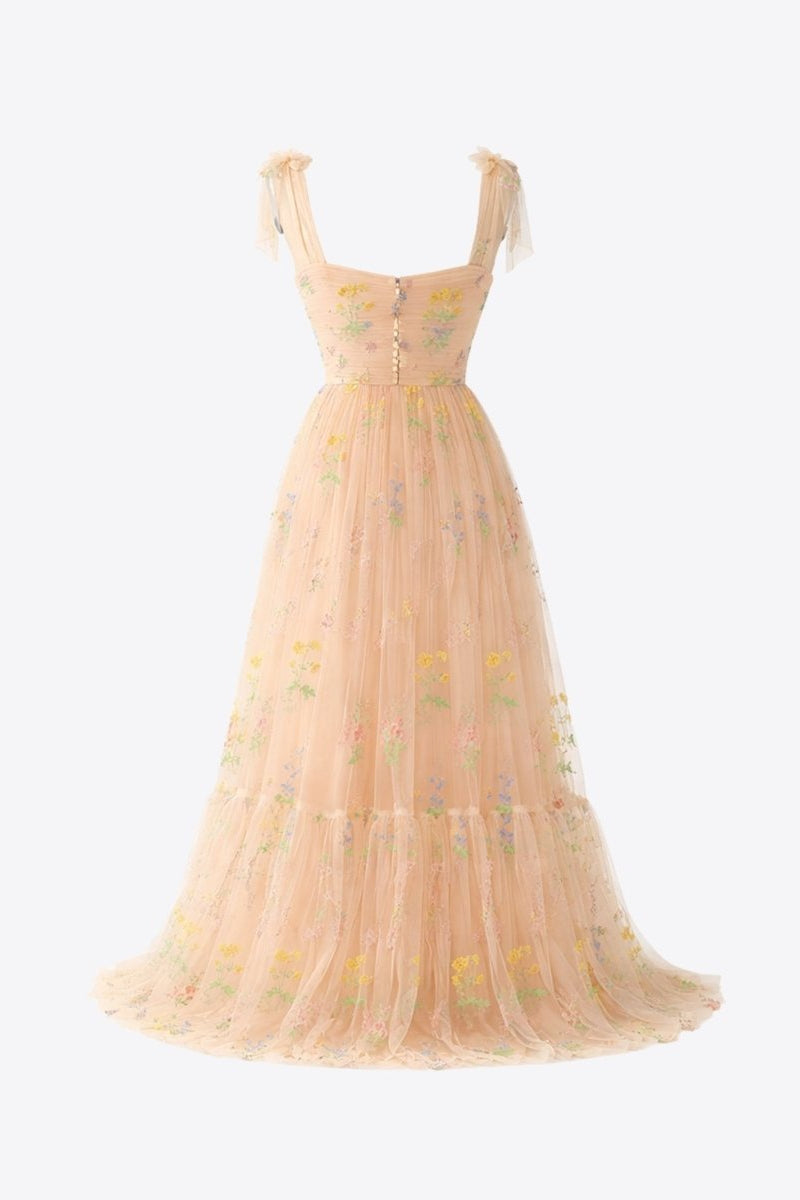 Back ghost mannequin view of peach tulle fairycore maxi dress showing structural corset details and back buttons.