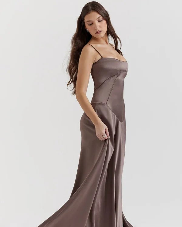 Gabriella Gown in Mocha: a brown satin corset maxi dress with a lace-up back, worn by a model.
