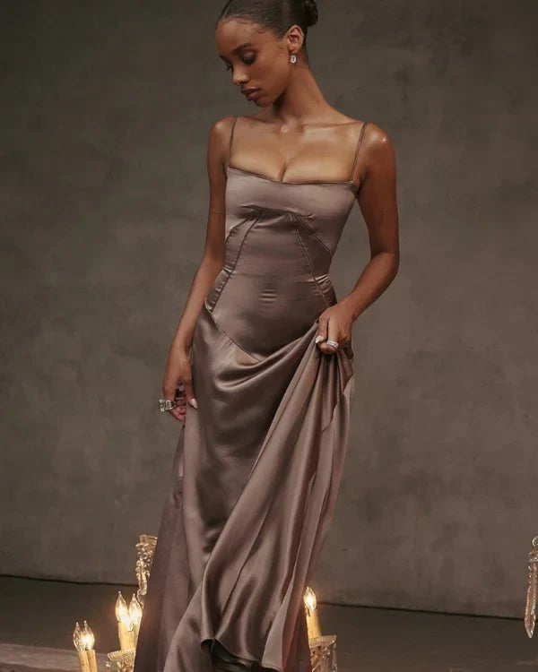 Gabriella Gown in Mocha: a brown satin corset maxi dress with a lace-up back, worn by a model.