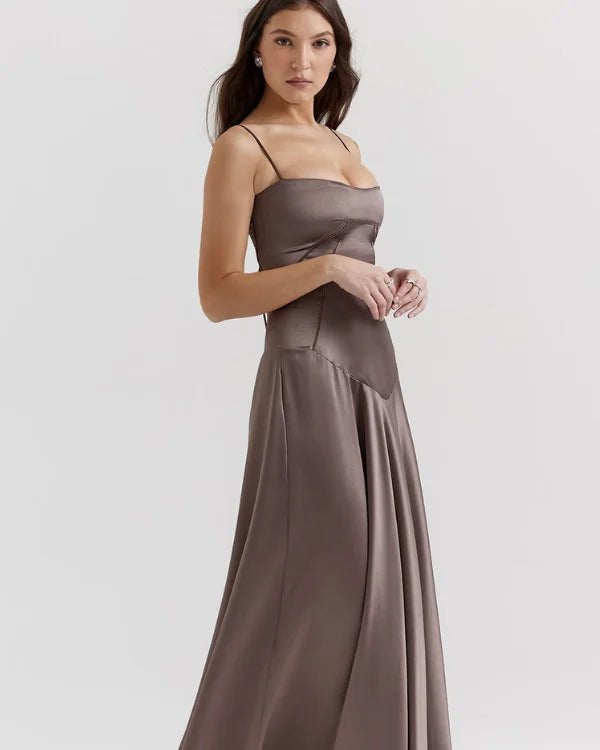 Gabriella Gown in Mocha: a brown satin corset maxi dress with a lace-up back, worn by a model.